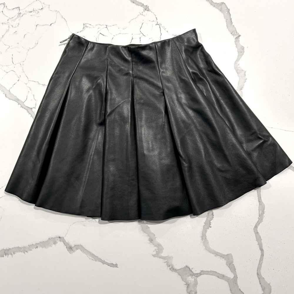 Girls Necessary Objects size medium black pleaded faux leather skirt